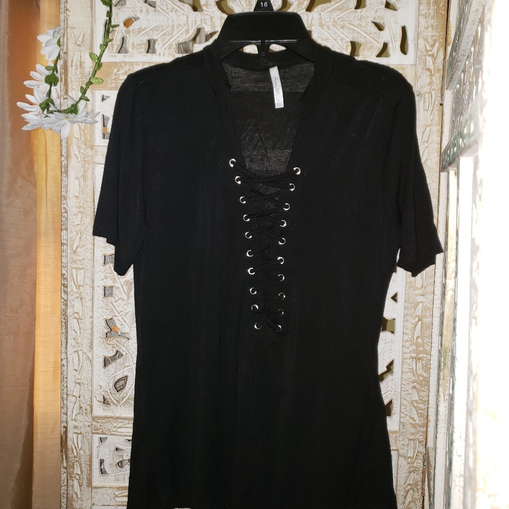 Black t-shirt with crisscross laces in the front